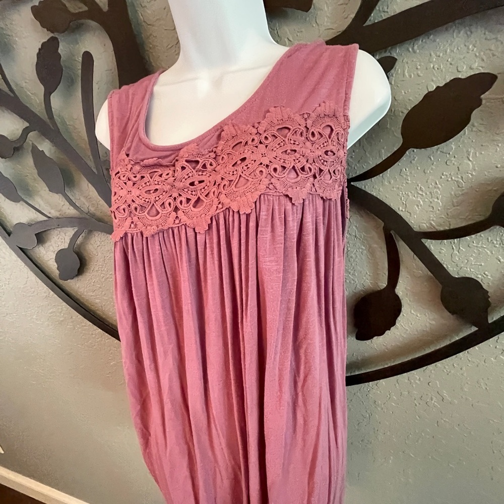 Suzanne Betro plus size woman’s sleeveless top.